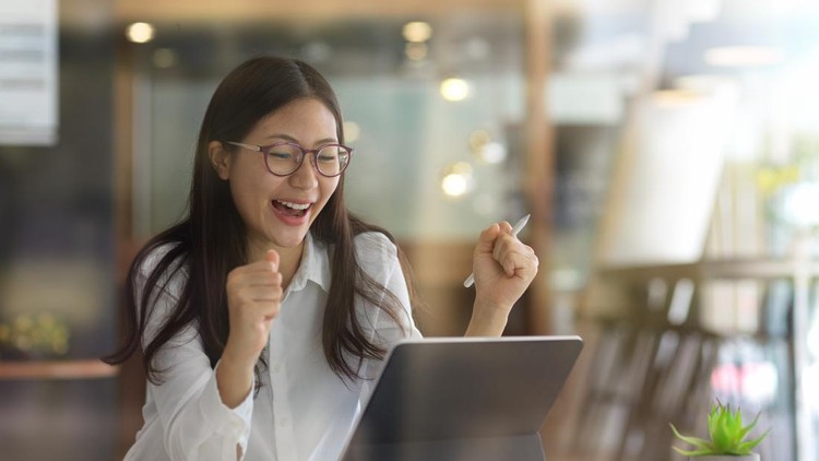 Young businesswoman getting exited about the work project in office room