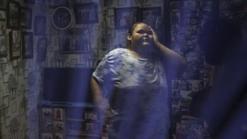 Intan Permatasari, 15, gestures at her home in Bogor, West Java province, Indonesia, August 20, 2026. Intan's confidence has returned as her weight has dropped. She goes to the gym, eats out with her parents, and returned to school last month. She st