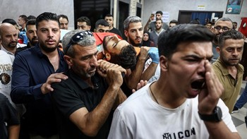 Mourners carry the body of one of two Palestinians killed in Al-Mughayyir, east of Ramallah, at Ramallah government hospital, after an Israeli settler attack followed by an Israeli army raid, in the occupied West Bank on September 2, 2026. Violence b