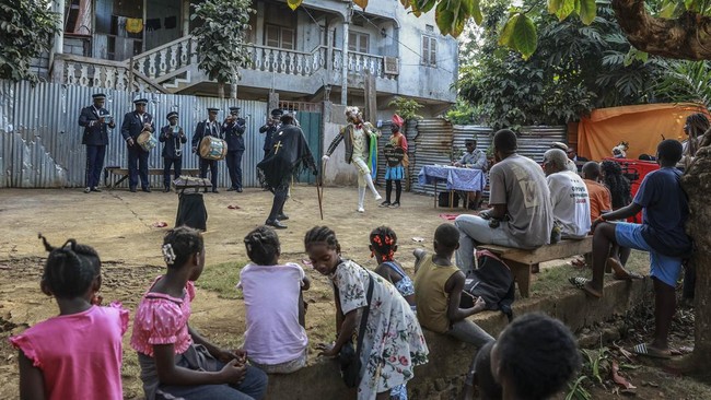 Characters from Boa Morte theatre troupe give a performance of Tchiloli, in Boa Morte near Sao Tome, capital of Sao Tome and Principe, on August 8, 2026. For several hours, in a courtyard between several houses in the commune of Boa Morte, in the nor