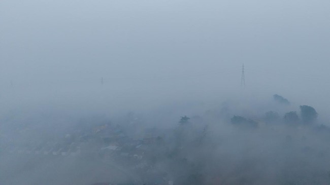 Kabut Asap Dampak Karhutla di Palembang