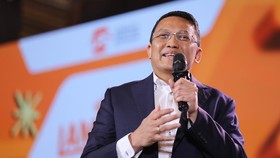 Direktur Finance & Strategy PT Bank Rakyat Indonesia (Persero) Tbk, Achmad Royadi saat menyampaikan pemaparan dalam Lampung Financial Festival di Hotel Novotel, Bandar Lampung, Minggu (6/9/2026). (CNBC Indonesia/Tri Susilo)