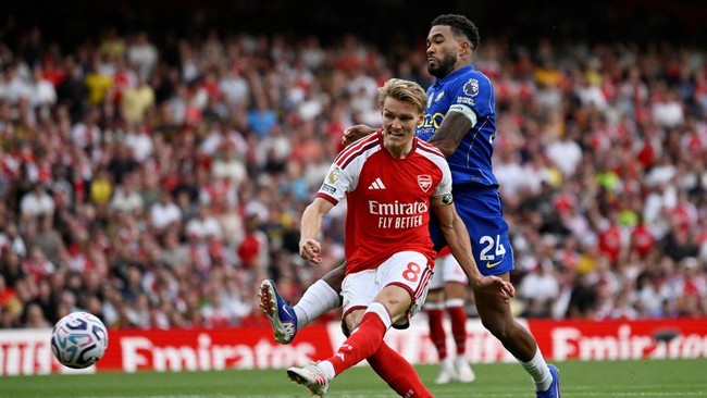 Soccer Football - Premier League - Arsenal v Chelsea - Emirates Stadium, London, Britain - September 6, 2026 Arsenal's Martin Odegaard scores their second goal REUTERS/Tony O Brien