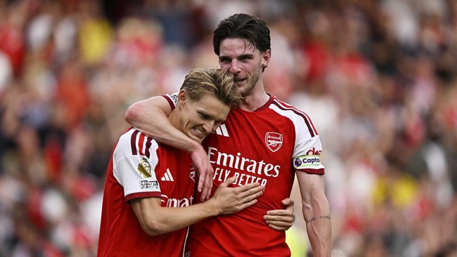 Soccer Football - Premier League - Arsenal v Chelsea - Emirates Stadium, London, Britain - September 6, 2026Arsenal's Declan Rice and Martin Odegaard celebrate after the match REUTERS/Tony O Brien