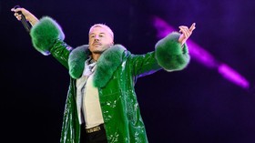 US rapper, singer, dancer and DJ, Benjamin Haggerty, known as Macklemore, performs at the Goldencoast Rap Festival in Corcelles-les-Monts, near Dijon, central-eastern France, on August 30, 2026. (Photo by ARNAUD FINISTRE / AFP)