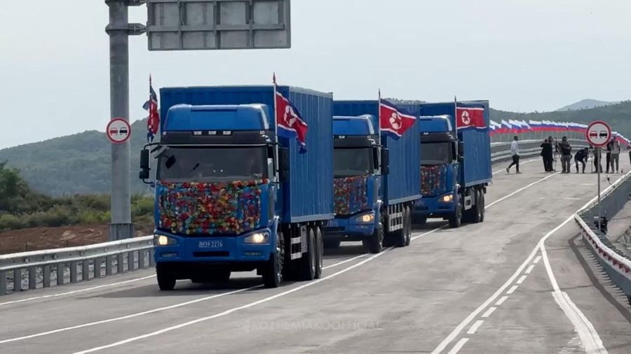 Trucks drive along a road during a ceremony opening the first road bridge between Russia and North Korea across the Tumen River, locally known as Tumannaya, on the border with North Korea in the Primorsky region, Russia, September 7, 2026, in this st