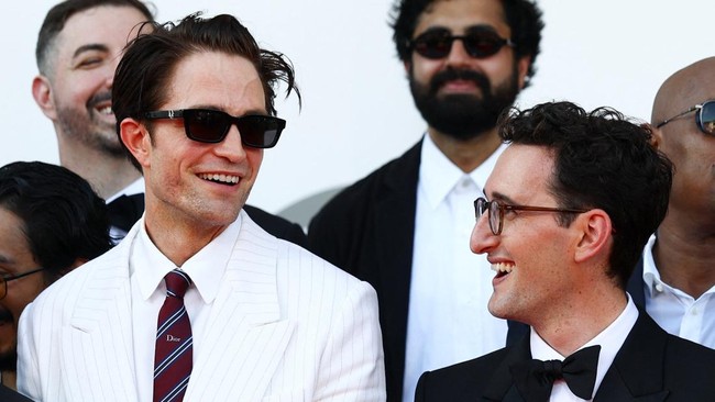 Director Lance Oppenheim and cast member Robert Pattinson pose on the red carpet during arrivals for the screening of the movie