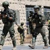Israeli forces conduct a raid in Anata, in the Israeli-occupied West Bank, September 8, 2026. REUTERS/Ammar Awad