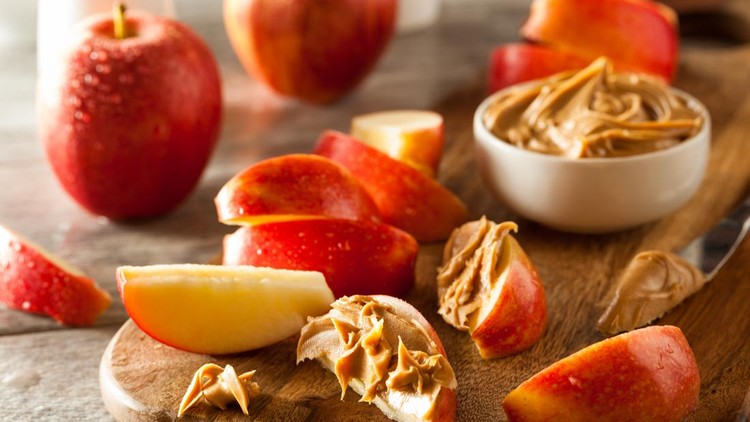 Organic Apples and Peanut Butter to Snack on