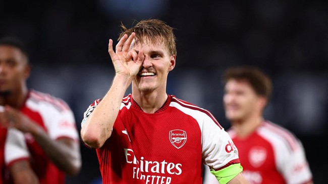 Soccer Football - UEFA Champions League - Napoli v Arsenal - Stadio Diego Armando Maradona, Naples, Italy - September 9, 2026 Arsenal's Martin Odegaard celebrates scoring their first goal REUTERS/Guglielmo Mangiapane