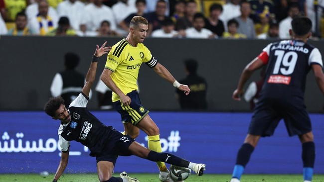 Soccer Football - Saudi Pro League - Al Nassr v Abha - Al Awwal Park, Riyadh, Saudi Arabia - September 9, 2026 Al Nassr's Cristiano Ronaldo in action with Abha's Khaled Al Shamrani REUTERS/Hamad I Mohammed