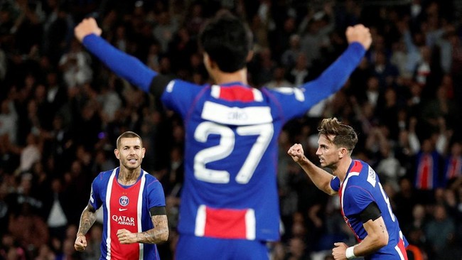 Soccer Football - UEFA Champions League - Paris St Germain v Slovan Bratislava - Parc des Princes, Paris, France - September 9, 2026 Paris St Germain's Fabian Ruiz celebrates scoring their sixth goal with Lucas Hernandez REUTERS/Benoit Tessier     TP