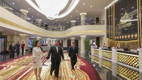 North Korean leader Kim Jong Un and his daughter Kim Ju Ae walk inside a hotel during a ceremony to celebrate the completion of the Wonsan Kalma Coastal Tourist Zone, in Wonsan, in North Korea, June 24, 2025.  KCNA via REUTERS/File Photo    ATTENTION