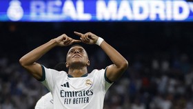 Real Madrid's French forward #10 Kylian Mbappe celebrates scoring his his team's fourth goal during the Spanish league football match between Real Madrid CF and Rayo Vallecano de Madrid at Santiago Bernabeu Stadium in Madrid on September 12, 2026. (P