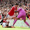 Soccer Football - Premier League - Manchester United v Manchester City - Old Trafford, Manchester, Britain - September 13, 2026 Manchester City's Erling Haaland in action with Manchester United's Lisandro Martinez, Harry Maguire and Youri Tielemans A