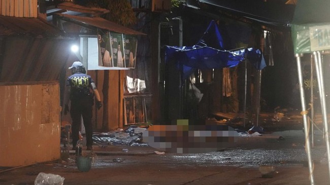 Police investigate the scene of a shooting incident outside a polling station in Cotabato City early on September 14, 2026, ahead of the first election to be held in the Bangsamoro Autonomous Region in Muslim Mindanao or BARMM. Voters across the Phil