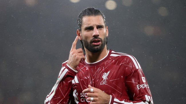 Soccer Football - Carabao Cup - Third Round - Liverpool v Tottenham Hotspur - Anfield, Liverpool, Britain - September 15, 2026 Liverpool's Dominik Szoboszlai celebrates scoring their third goal REUTERS/Scott Heppell EDITORIAL USE ONLY. NO USE WITH UN