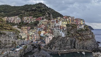 A drone view shows the coastal village of Manarola, part of the Cinque Terre, in Liguria, Italy, September 8, 2026. REUTERS/Ilan Rosenberg