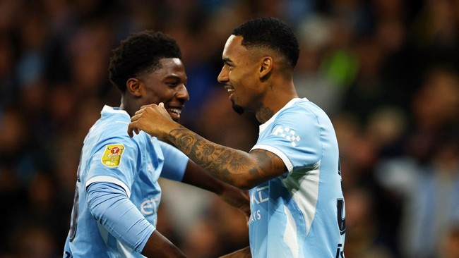 Soccer Football - Carabao Cup - Third Round - Manchester City v Norwich City - Etihad Stadium, Manchester, Britain - September 17, 2026 Manchester City's Allan Elias celebrates scoring their third goal with Ryan McAidoo REUTERS/Phil Noble EDITORIAL U
