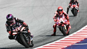Aprilia Racing's Spanish driver Jorge Martin (L) and Ducati Lenovo Team's Spanish driver Marc Marquez compete during the Sprint event of the Grand Prix of Austria MotoGP in Spielberg bei Knittelfeld, Austria, on September 19, 2026. (Photo by Joe Klam
