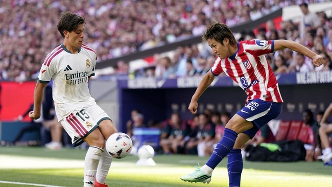 Soccer Football - LaLiga - Atletico Madrid v Real Madrid - Riyadh Air Metropolitano, Madrid, Spain - September 20, 2026 Atletico Madrid's Lee Kang-in in action with Real Madrid's Arda Guler REUTERS/Ana Beltran