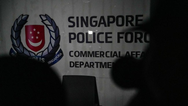 A fake logo of Singapore Police Force, inside a building of the Legend Innovation Co., Ltd., also known as Meun Chey Commercial City or Legend Park, a site linked to online scam operations and forced labour abuses, in Tbong Wat village, Krabao commun