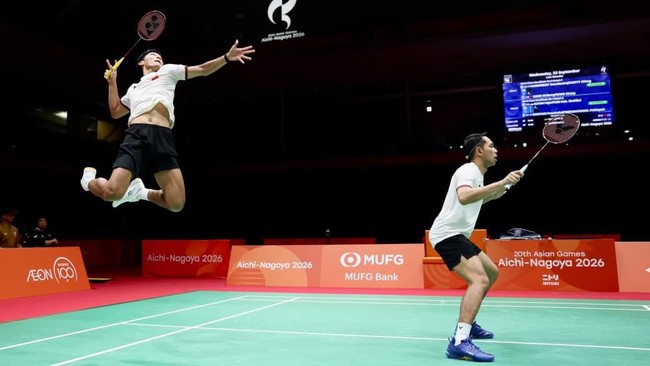 Fajar Alfian/Muhammad Shohibul Fikri saat berlaga di semifinal beregu putra Asian Games 2026. (Arsip PBSI)
