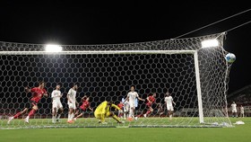 Asian Games - Aichi-Nagoya 2026 - Football - Men's - Group D - South Korea v Saudi Arabia - Nagoya City Mizuho Park Rugby Field, Nagoya, Japan - September 22, 2026 South Korea's Minha Shin scores their first goal past Saudi Arabia's Yazan Alruwaili R