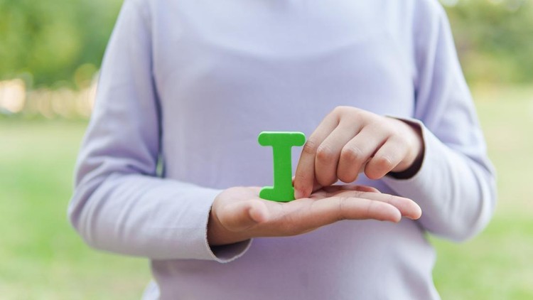 Child Holding Letter 
