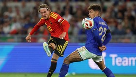 Soccer Football - Nations League - Group A - Italy v Belgium - Stadio Olimpico, Rome, Italy - September 25, 2026 Italy's Giovanni Di Lorenzo in action as Belgium's Mika Godts shoots at goal REUTERS/Ciro De Luca
