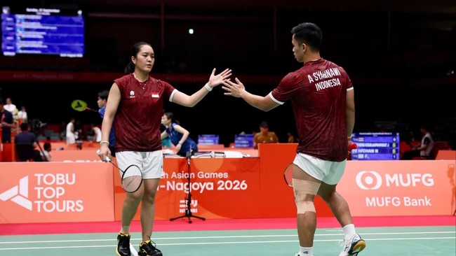 Amri Syahnawi/Nita Violina Marwah saat berlaga di babak perempat final Asian Games 2026.