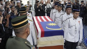Members of the Malaysian Armed Forces carry the casket of Siti Hasmah Mohamad Ali, the wife of former Malaysian prime minister Mahathir Mohamad, during her funeral at As Syarif Mosque in Kuala Lumpur on September 28, 2026. Hasmah, the wife of Malaysi