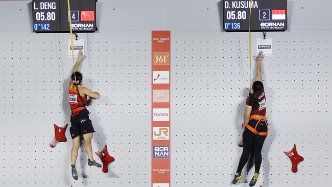 Asian Games - Aichi-Nagoya 2026 - Sport Climbing - Women's Speed 4 - Final - Nagoya International Exhibition Hall, Nagoya, Japan - September 30, 2026 China's Lijuan Deng and Indonesia's Desak Made Rita Kusuma Dewi in action REUTERS/Andrew Couldridge