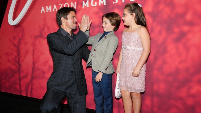 Josh Hartnett, Brady Wagner and Sienna Kulovitz pose on the red carpet for the premiere of 'Verity,' in New York City, US, September 29, 2026. REUTERS/Angelina Katsanis