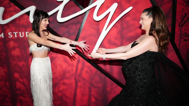 Dakota Johnson and Anne Hathaway pose on the red carpet for the premiere of Verity, in New York City, US, September 29, 2026. REUTERS/Angelina Katsanis