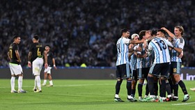 Soccer Football - International Friendly - Argentina v Bolivia - Estadio Mario Alberto Kempes, Cordoba, Argentina - September 30, 2026 Argentina's Cristian Romero celebrates scoring their third goal with teammates REUTERS/Rodrigo Valle