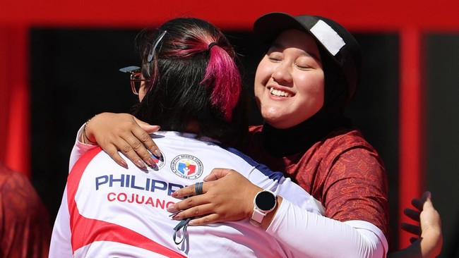 Asian Games - Aichi-Nagoya 2026 - Archery - Okazaki Central Park Multipurpose Square, Okazaki, Japan - October 1, 2026 Indonesia's Nurisa Dian Ashrifah celebrates after winning the compound women's individual gold medal match against Philippines' Ama