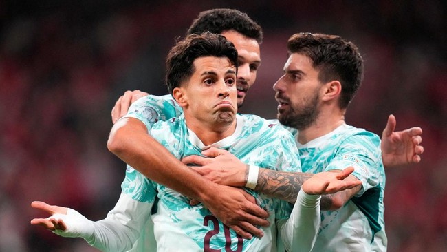 Soccer Football - UEFA Nations League - Group A4 - Denmark v Portugal - Parken, Copenhagen, Denmark - October 1, 2026 Portugal's Joao Cancelo celebrates scoring their first goal Liselotte Sabroe/Ritzau Scanpix via REUTERS      ATTENTION EDITORS - THI
