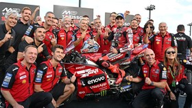 Ducati Lenovo Team rider Marc Marquez (centre R) of Spain and his team officers celebrate his victory during the sprint race podium ceremony of MotoGP Japanese Grand Prix at the Mobility Resort Motegi in Motegi, Tochigi prefecture on October 3, 2026.