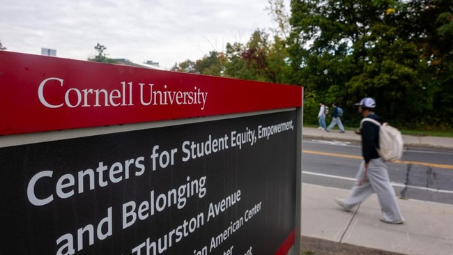ITHACA, NEW YORK - SEPTEMBER 30: Students walk on the campus of Cornell University a day after on September 30, 2026, in Ithaca, New York. A New York state attorney general has announced a review of the schools initial response to allegations from a 