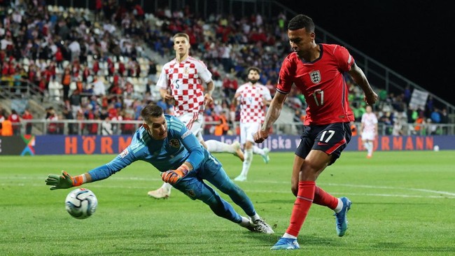 Soccer Football - UEFA Nations League - Group A3 - Croatia v England - Stadion HNK Rijeka, Rijeka, Croatia - October 3, 2026 England's Morgan Rogers scores their seventh goal past Croatia's Dominik Livakovic Action Images via Reuters/Paul Childs     
