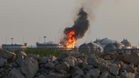 Flames burn at a facility belonging to Saudi oil giant Aramco south of Riyadh on October 3, 2026. The circumstances remained unclear but in recent weeks Aramco, majority-owned by the Saudi state, has come under attack from the Houthi authorities targ