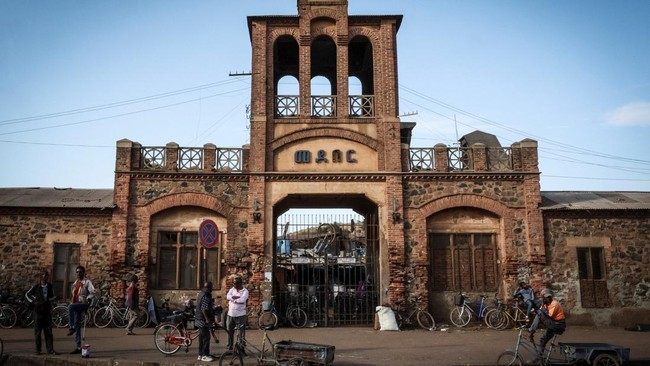 People stand with bicycles outside the Medeber Market, an open-air recycling and craft market in downtown Asmara, Eritrea, June 22, 2026. Eritrea has long been isolated by the West, which views the East African country as among the most repressive in