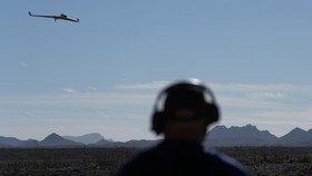 A drone pilot guides a Opterra drone at the Yuma Proving Grounds during the testing of anti-drone technology by the US military near Yuma, Arizona, US, September 22, 2026. REUTERS/Mike Blake