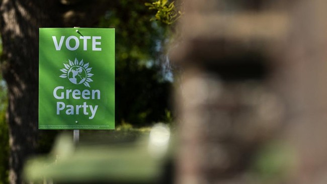 A photograph taken on April 27, 2026 shows a party election poster for Britain's Green party in Hartfield, south-east England, ahead of the UK local elections on May 7. Analysts and lawmakers say Starmer faces his biggest moment of peril after what a