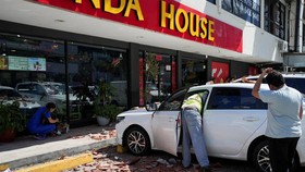 A car damaged by falling debris after an earthquake struck near the southern coast of Panama, in Panama City, Panama, October 9, 2026. REUTERS/Enea Lebrun