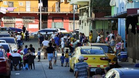 People spend time on a street after an earthquake struck near the southern coast of Panama, in Panama City, Panama, October 9, 2026. REUTERS/Enea Lebrun TPX IMAGES OF THE DAY
