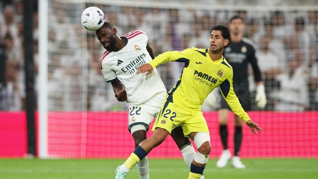 Soccer Football - LaLiga - Real Madrid v Villarreal - Estadio Bernabeu, Madrid, Spain - October 10, 2026 Real Madrid's Antonio Rudiger in action with Villarreal's Ayoze Perez REUTERS/Alejandro Martinez Velez
