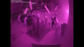 Surveillance footage shows debris falling as people react at the moment of an attack at King Khalid International Airport in Riyadh, Saudi Arabia, October 10, 2026, in this frame from a handout video. Saudi Ministry of Media/Handout via REUTERS    TH