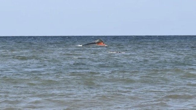 A portion of the vessel floats after it capsized while carrying about 305 people from Djibouti to Yemen, leaving at least 109 migrants, including 15 children, dead and more than 116 missing, according to the United Nations' International Organization
